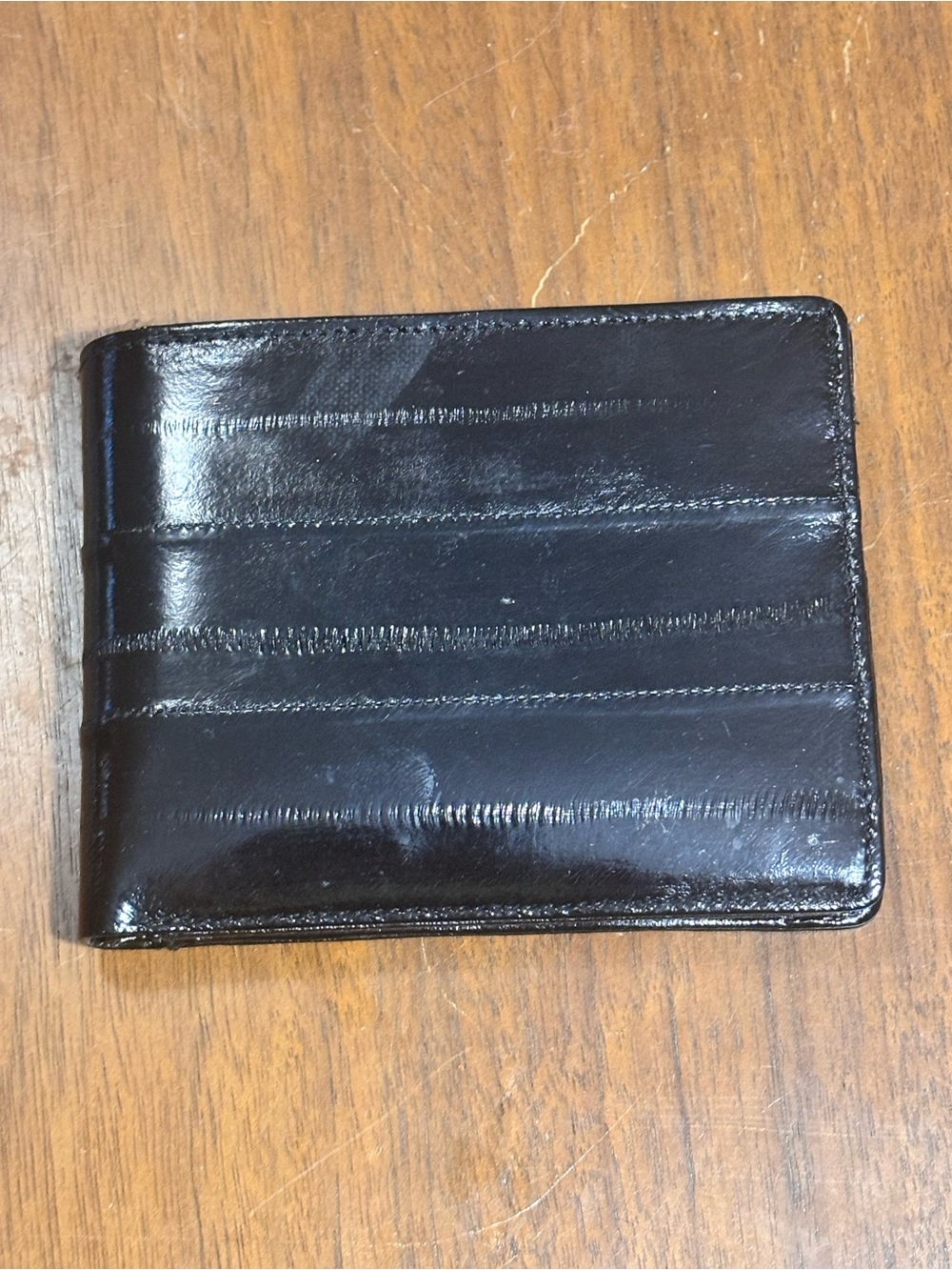 New Lee Sands vintage black bifold wallet crafted from genuine eel skin.